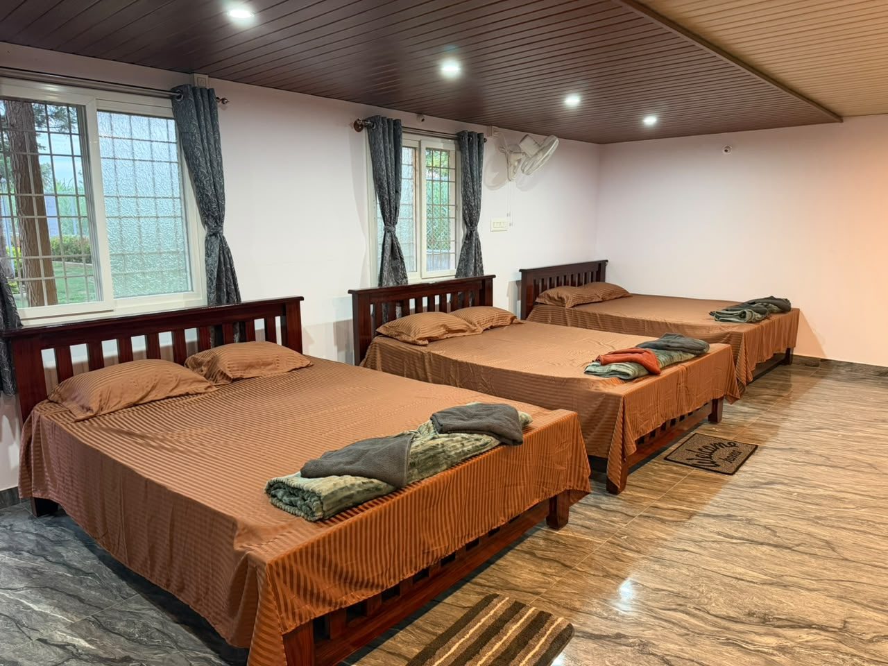 Room with three beds