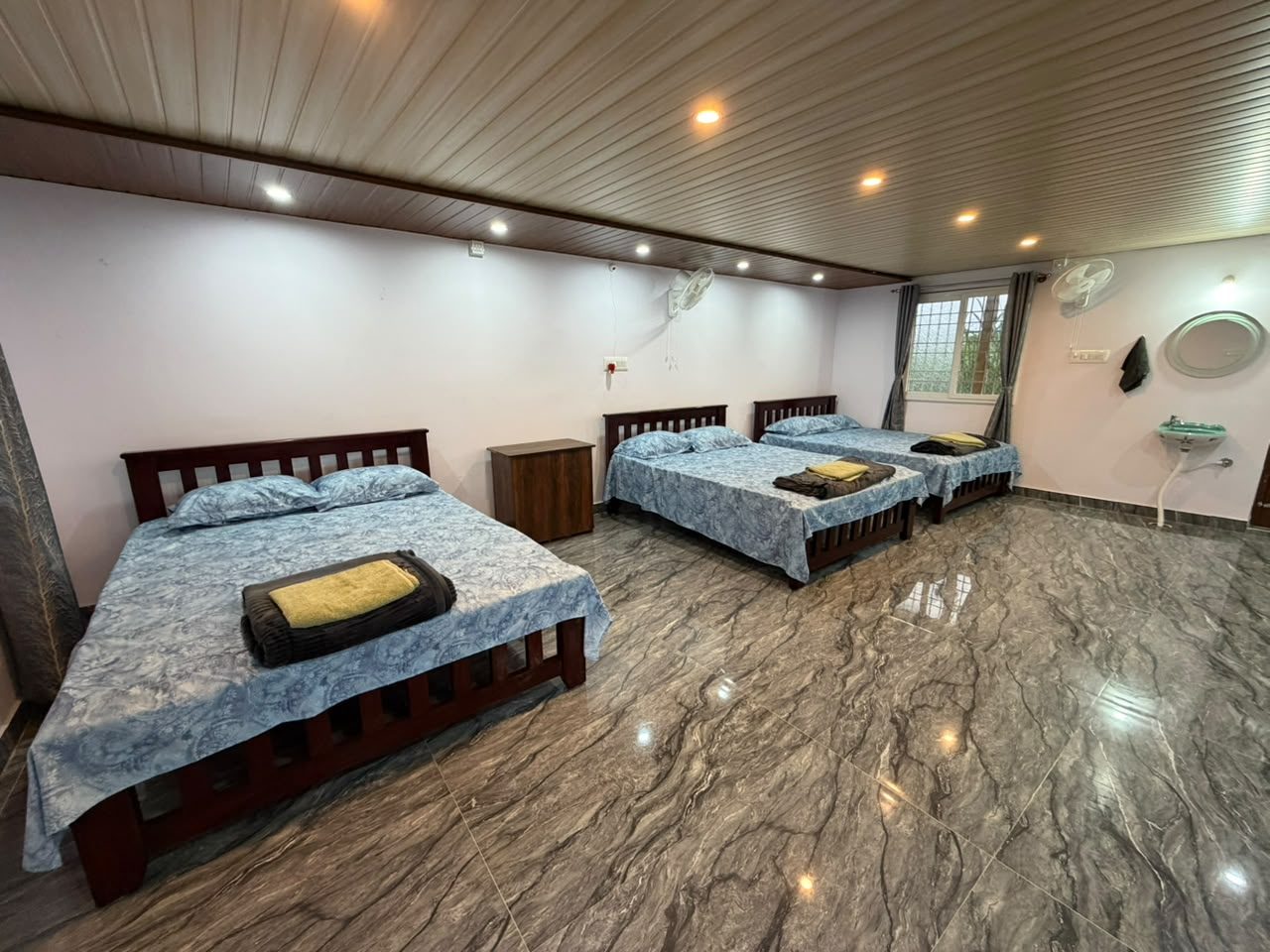 Room with several beds
